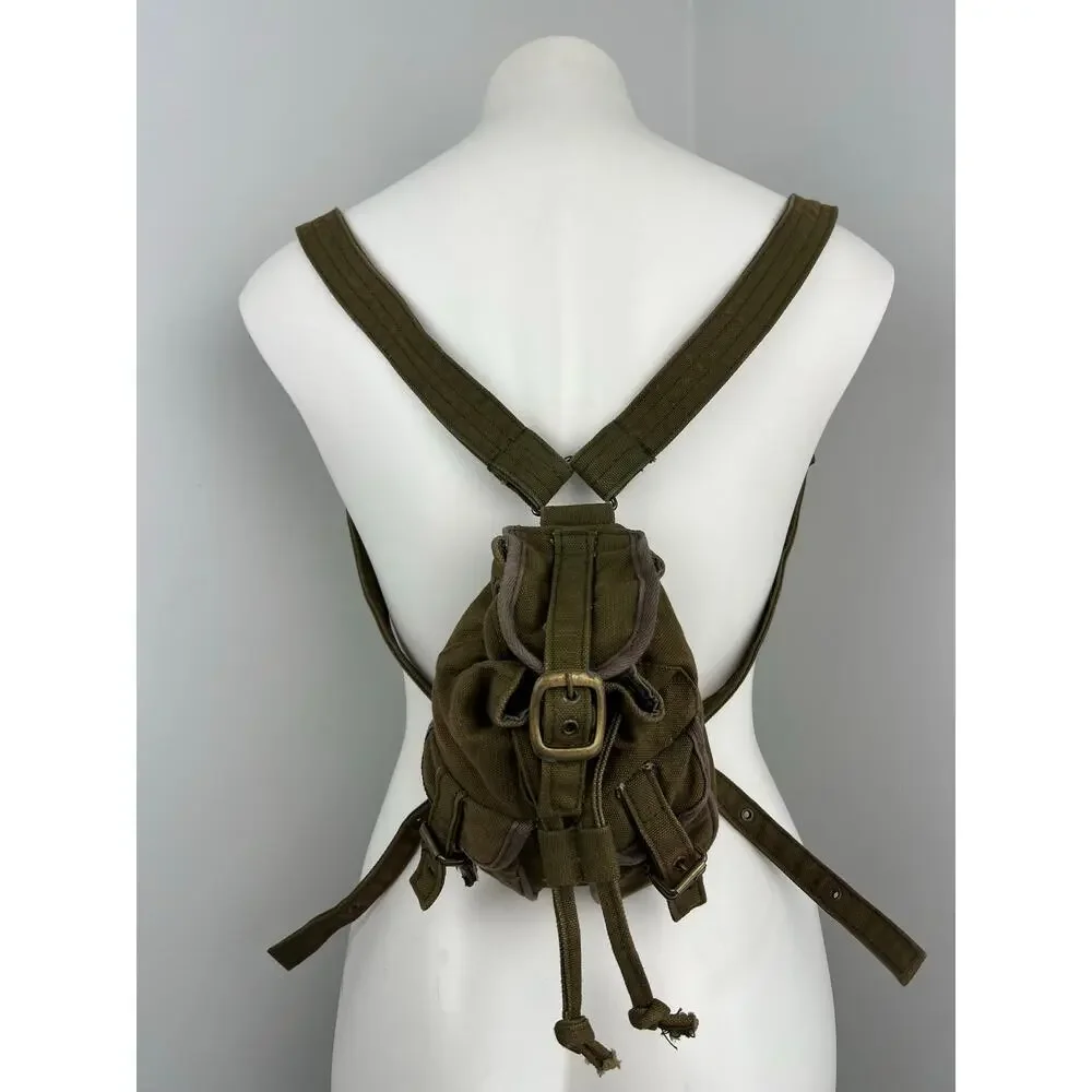 army green mini backpack BODHI Drawstring Bag with Exterior Cargo Double Zipper Pockets, Olive Sandwich Mesh Dim Brown Trim MINI BACKPACK WITH LIFTING BELT STORAGE Built for packing light Vintage Yak Pak Y2K Military